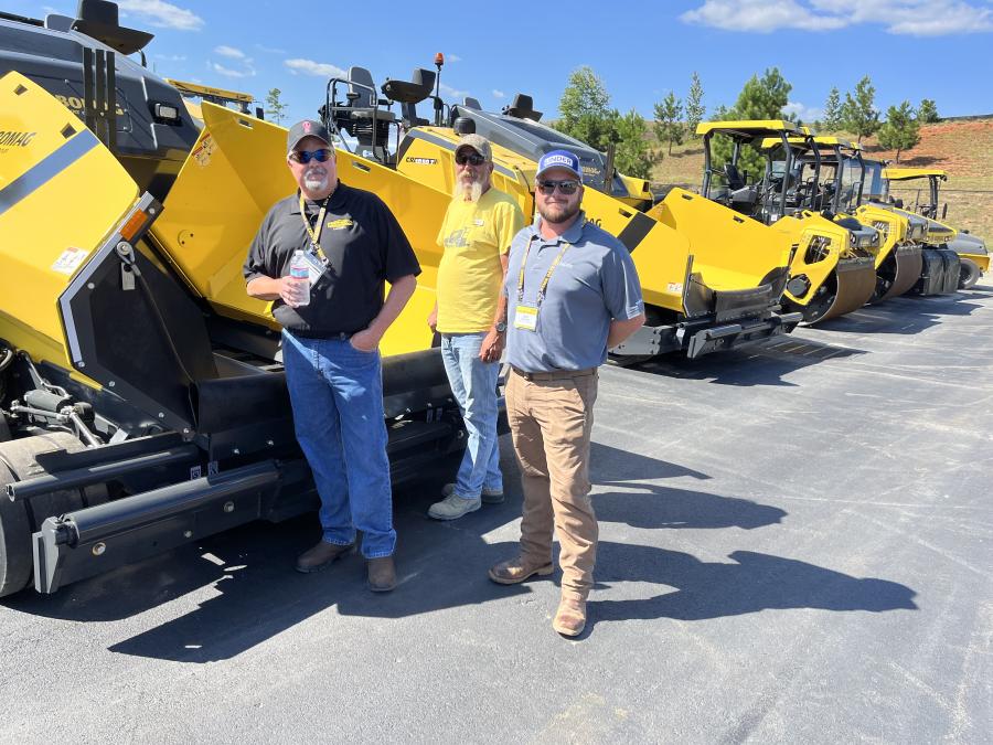 Looking over the BOMAG CR 1030 W paver lineup (L-R) are Rick Buckner of Harrison Construction, Asheville, N.C.; David Seiger of BOMAG; and Drew Blankenship of Linder Industrial Machinery in Asheville, N.C.
(CEG photo)