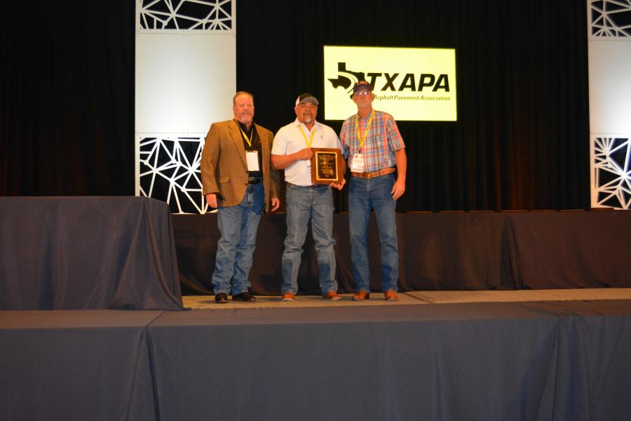 Lipham Asphalt and Paving Company LLC and Ricky Gonzales, TXDOT district specialist, won the Sealcoat award in the Abilene district. (CEG photo)
