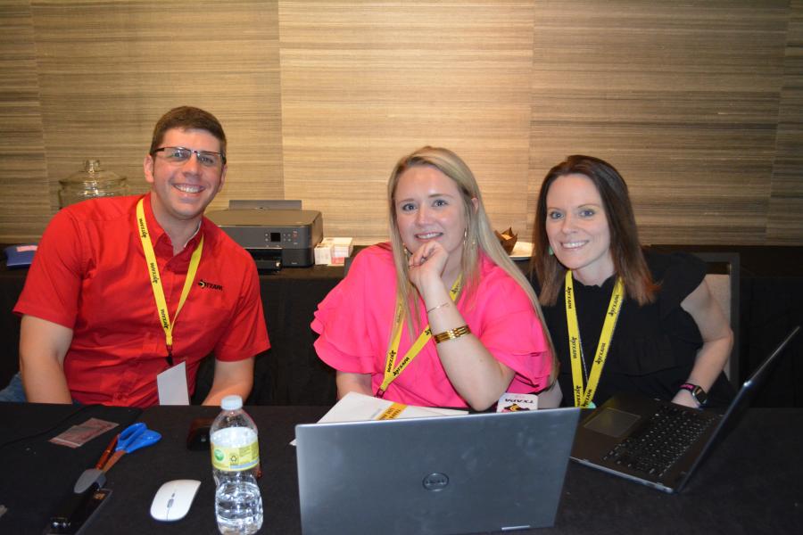 The registration desk was a busy spot throughout the event’s four-day run. (L-R): TXAPA staffers Steve Roensch, Emma Catron and Becky Schaeffer made the registration process quick and easy for attendees. (CEG photo)