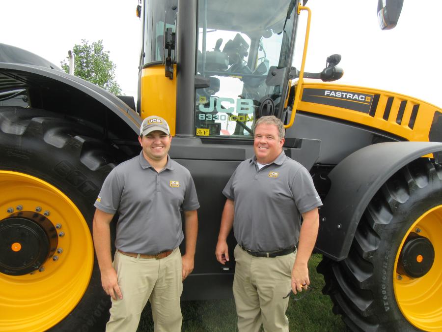 Brandon Hawkins (L), JCB regional sales manager, and Dan Wilhelm, Ag sales engineer, welcome attendees to review JCB’s equipment lineup.
(CEG photo)