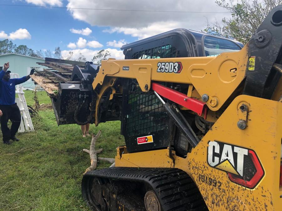 This compact track loader and grapple bucket was donated by Cleveland Brothers to help with the cleanup of Hurricane Ian. (Photo courtesy of First Response Team of America Facebook page)