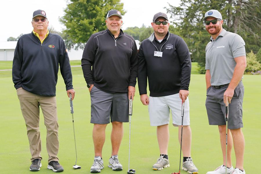 (L-R) are Dave Clark of Wicks Construction; Brent Thorn of JTV Manufacturing Inc.; Neal Carolan of Central Steel & Wire; and John Paul Schmidtlein of Road Machinery & Supplies Co.
(GOMACO photo)