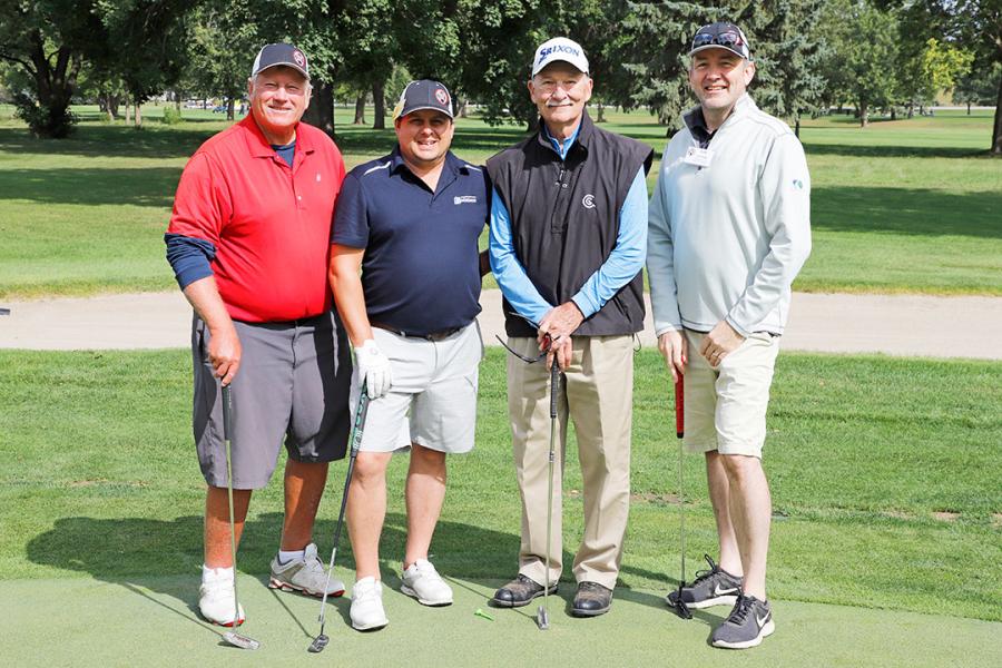 (L-R) are Eric Kaiser of Legends Concrete Inc.; Pier-Hugues Gravel of Trottoirs Joliette Inc.; Bob Newman of Road Machinery & Supplies Co.; and Leif Wathne of National Concrete Pavement.
(GOMACO photo)