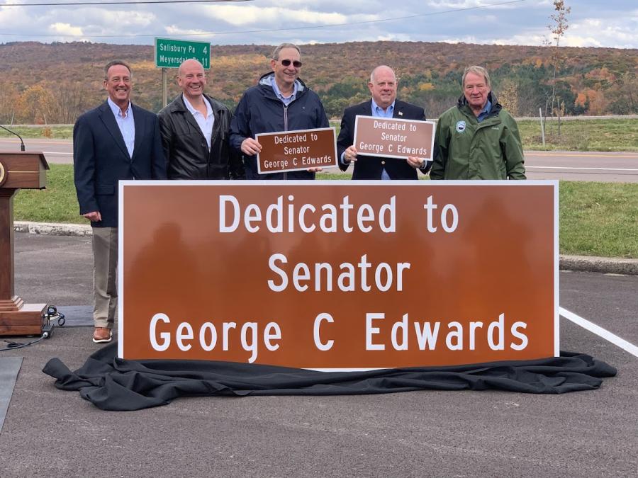Pictured with the new sign after the unveiling (L-R) are Jim Ports, Maryland secretary of transportation; Paul Edwards, Garrett County commissioner; Sen. George Edwards; Gov. Larry Hogan; and Del. Wendell Beitzel.
(CEG photo)