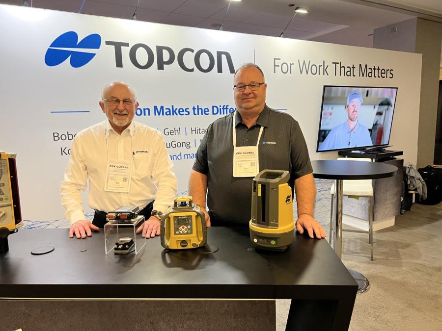 Topcon, a provider of machine control systems for the construction industry, displayed its line of workflow solutions at AED Summit/CONDEX in Chicago. Pictured at Topcon’s booth are Ron Ludchak (L), director of global sales, and Joel Frost, director of the compact solutions group.
(CEG photo)