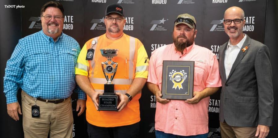 The State Truck Roadeo returned in 2022. (L-R) are Texas Transportation Commissioner Alvin New, Roadeo Champion Milton Kelley, Runner-up Matt Woolsey and TxDOT Executive Director Marc Williams.
(Photo courtesy of TxDOT.)