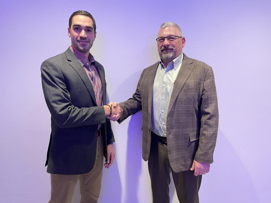 Zack Manz (L), president of Contractors Equipment Company Inc., and Peter Baschmann of Baschmann Services Inc. announce the acquisition of Baschmann Services Inc.