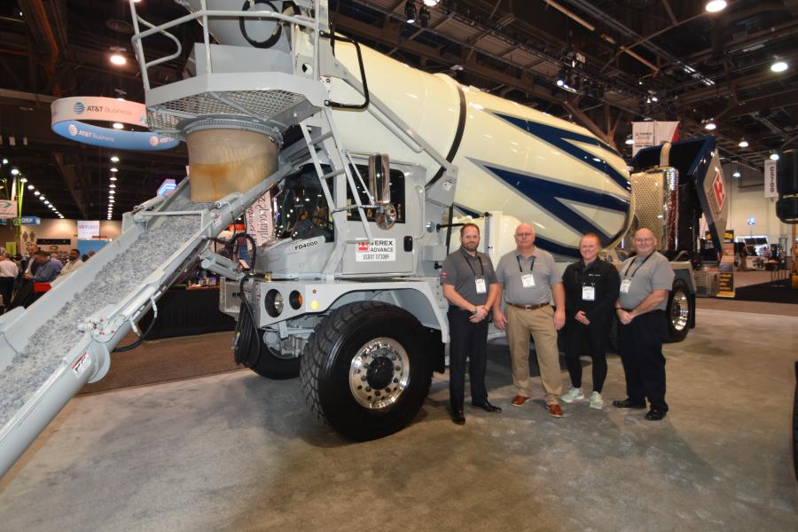 At the Terex Advance Mixer Inc. booth Kevin Fix, director of machine sales; Dave Grabner, general manager; Cari Mansfield, HSE manager; and Sam Cimilluca, region sales manager, talk about the benefits of the FD4000 front discharge mixer, part of the commander series. 
(CEG photo)