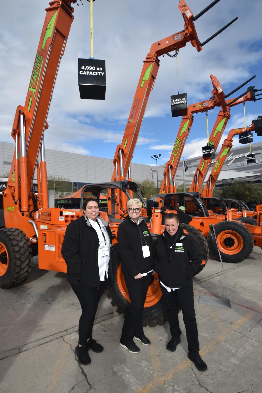 Xtreme Manufacturing, a supplier of telehandlers to the North American market, occupied its traditional outdoor space at WOC 2023. Pictured here are the marketing team of (L-R) Ashley Robles, Barb Canibano and Tiffany Pace. 
(CEG photo)