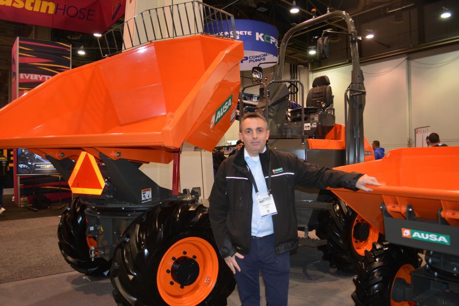 Ignasi Moner, CEO of AUSA USA, displayed the company’s line of dumpers, including the DR601AHG, which features a 13,200-lb. load capacity and a rotating unloading system. 
(CEG photo)