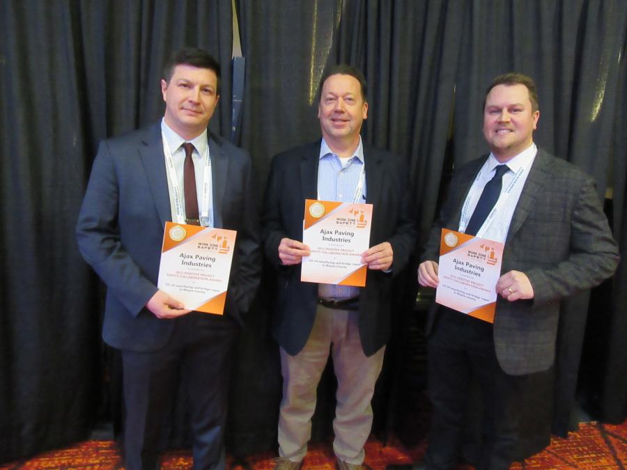 (L-R): Alex Vasquez of Ajax Paving Industries; MDOT’s Colin Forbes; and Matt Payne, also of Ajax Paving Industries, are presented with a work zone safety award.
(CEG photo)
