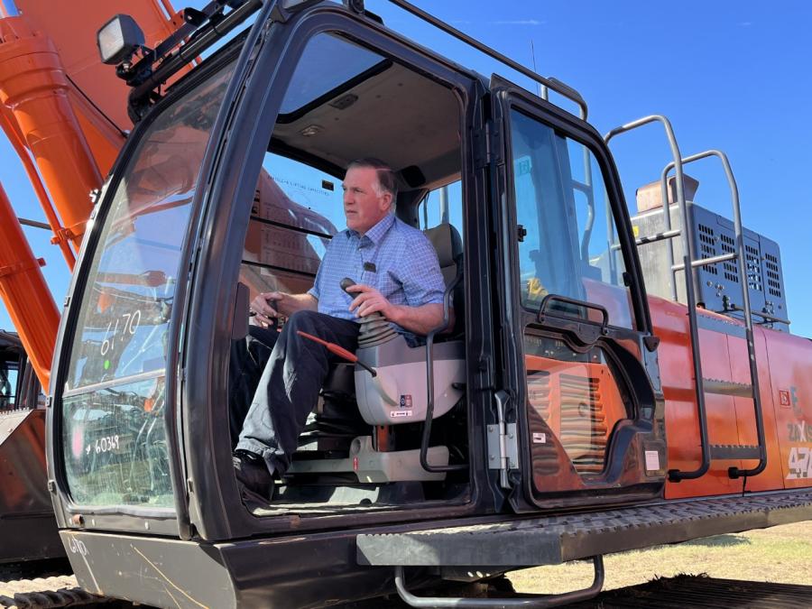 Ken Weaver of Weaver’s Equipment Sales, Milton, Pa., puts this Hitachi 470 excavator to the test during machine inspection.
(CEG photo)