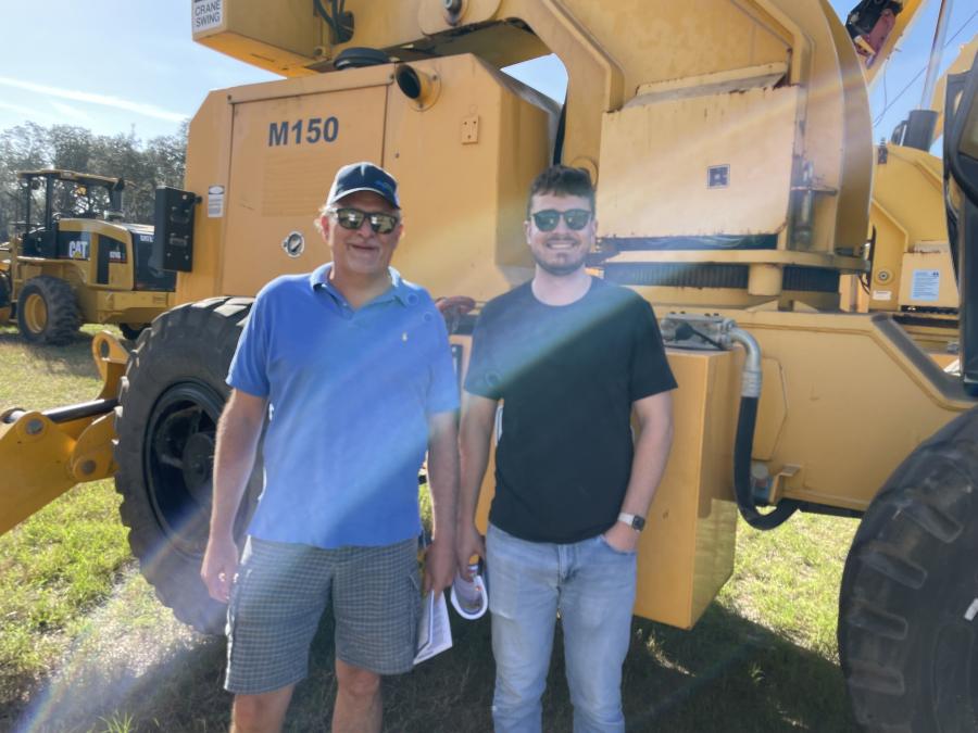 Ken Lillycrop (L) and Joel Lillycrop, both of Bryan’s Auction & Sales, Ontario, Canada, stand in front of a Manitex crane.
(CEG photo)