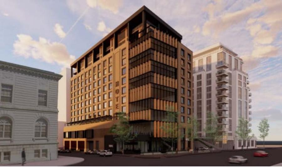 View from Congress and Exchange streets looking towards the proposed hotel in black and brown, and the massing of future phases in light gray. (Rendering courtesy of Johnson Nathan Strohe Architecture and Interior Design)