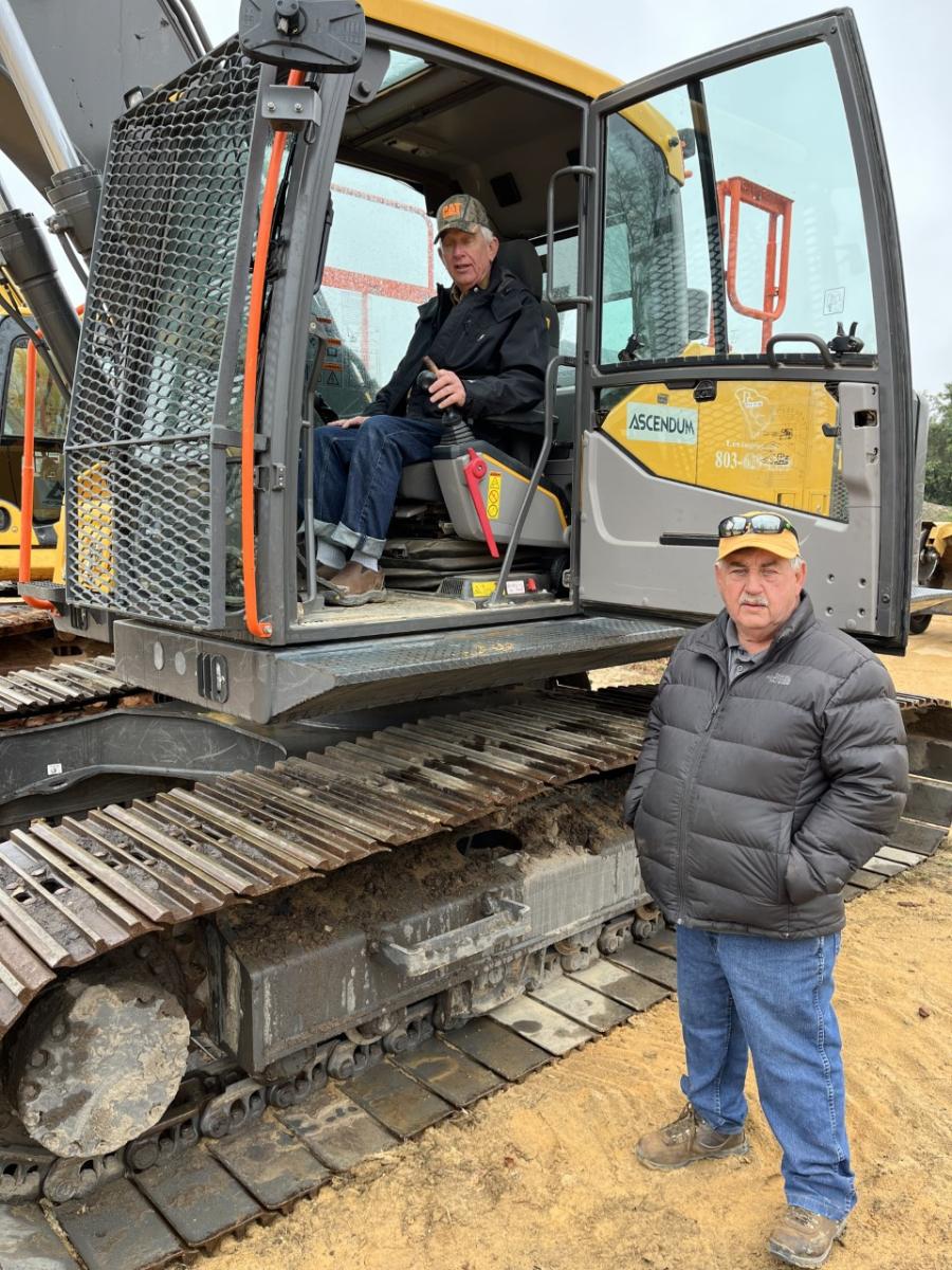 Roger West in the operator’s seat and Benny Orr, both of K&B Land Clearing in Robbinsville, N.C., liked this Volvo EC220EL excavator with the thumb and hoped to be able to put it to work next week.
(CEG photo)