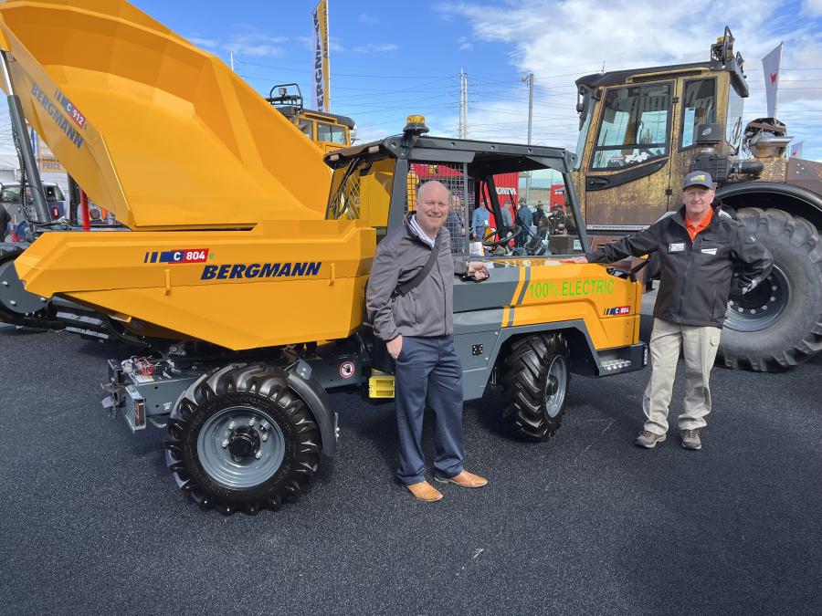 Jeff Smith (L) of Rudd Equipment Company, Louisville, Ky., discusses the details of this 100 percent electric C 804 dumper with Kevin O’Donnell, president of Bergmann Americas. 