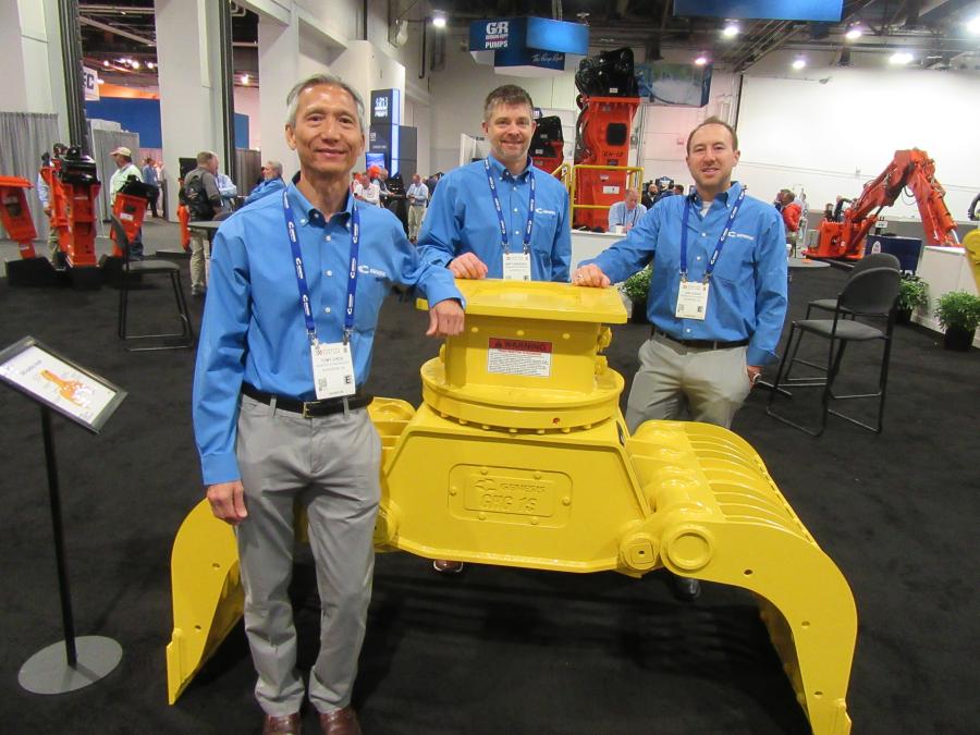 (L-R): Tony Choo, Matt Orvedahl and Joh Fodor, all of Genesis Attachments with the handling grapple.  