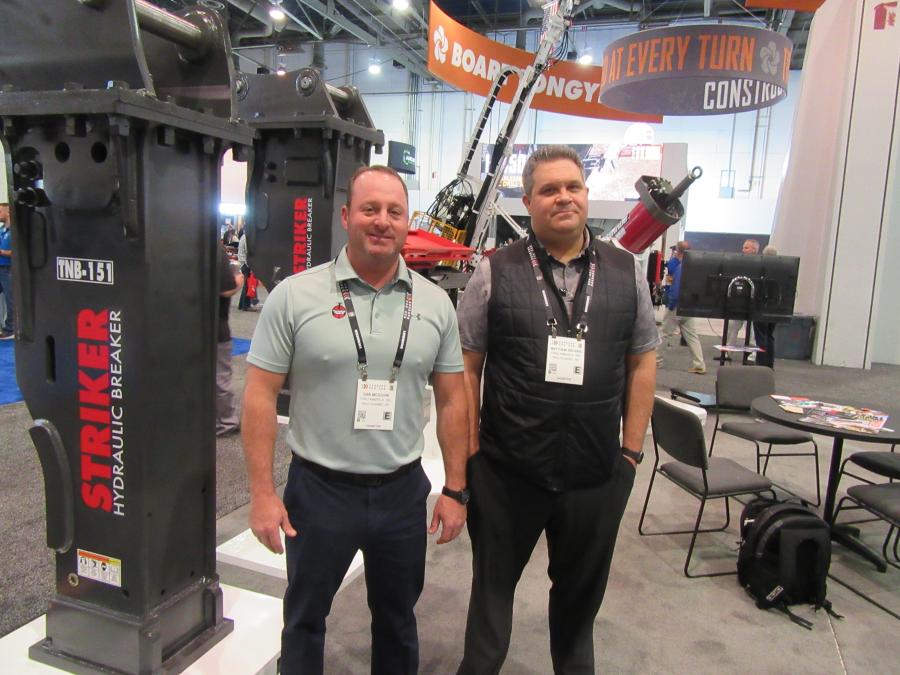 Toku America’s Todd Story (L) and Mathew Gruden discussed the company’s lineup of construction and demolition attachments at ConExpo. 