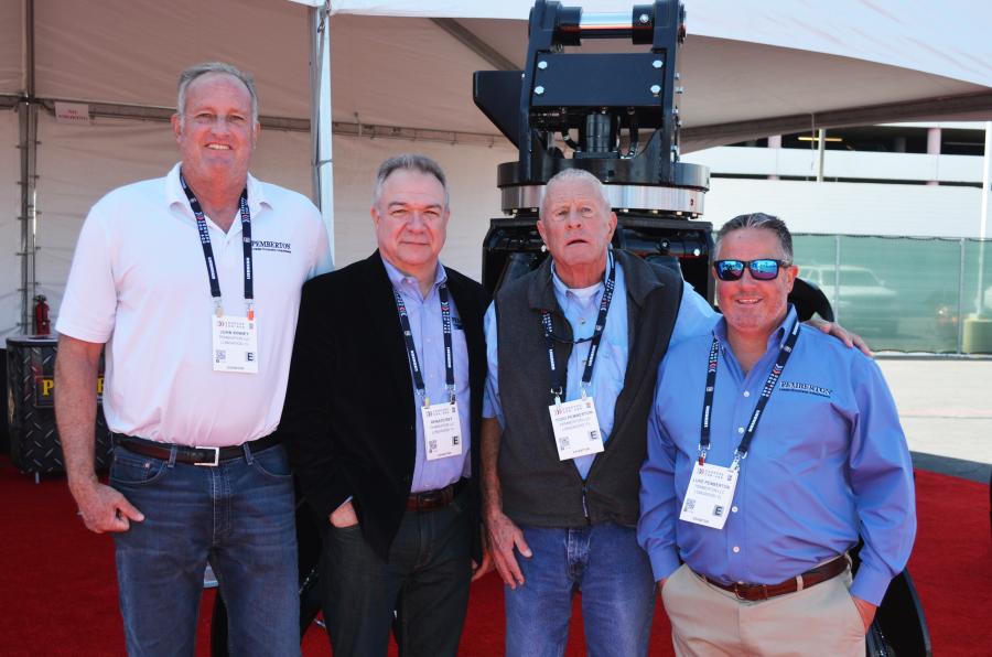 A nice array of attachments at the Pemberton exhibit were promoted by a host of representatives and owners including (L-R) John Kinney, Renato Rey, Todd Pemberton and Luke Pemberton. 