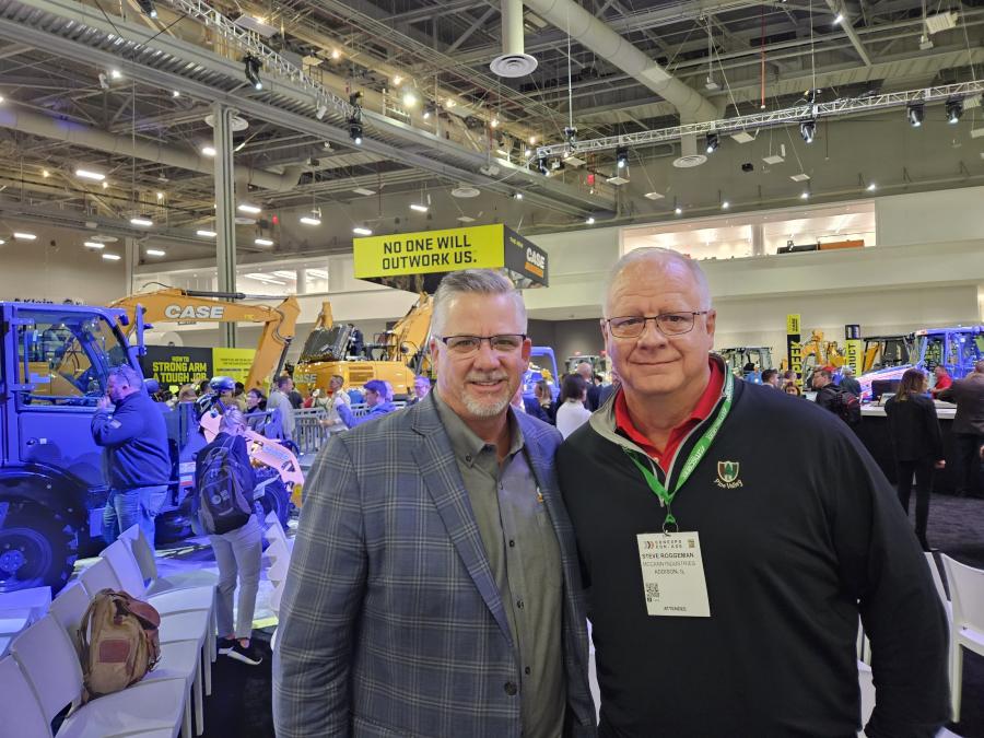Terry Dolan (L) vice president of construction of Case Construction Equipment North America gave Steve Roggeman, president of McCann Industries, Addison, Ill., a tour of Case’s newest equipment at ConExpo. 
 