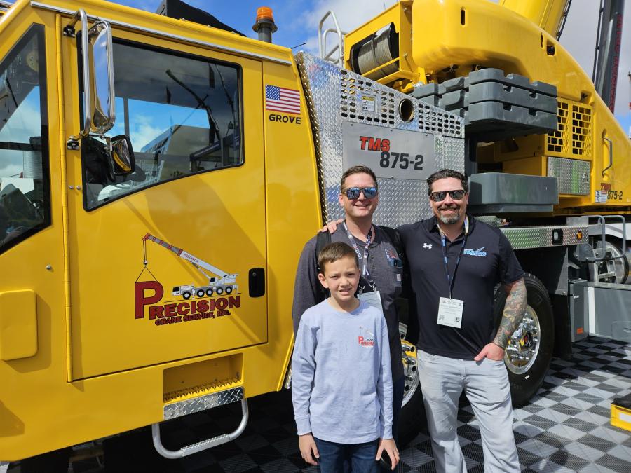 The first Grove TMS 875-2 to come off the assembly line was sold to Precision Crane Services, Windsor, Calif. (L-R) are Tyler Elliff, CJ Eliff and Robert Johnson Jr. of Western Pacific Crane & Equipment, headquartered in California, with eight locations serving the West Coast, Pacific Northwest, Hawaii and Alaska. 