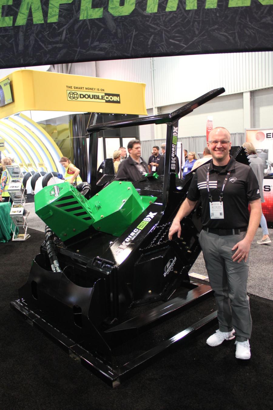 Matt Nelson, director of development of Diamond Mowers, Sioux Falls, S.D., with the company’s bestselling SK Disc Mulcher, ideal for large mulch and brush management applications. 