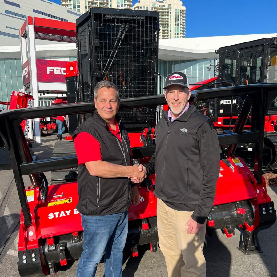 Mark Middendorf (L), executive vice president of sales of Fecon, and Tim Gerbus, product and sales manager of Taylor Construction Equipment, at the Fecon booth at ConExpo 2023.