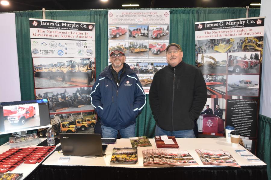 James G Murphy, a commercial and industrial auctioneer in the northwest, is represented by Todd Meyers (L) and Bob Jones at the expo with an assortment of information about its upcoming equipment auctions.
(CEG photo)