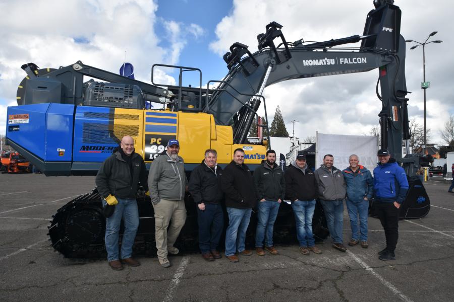Modern Machinery’s team of (L-R): Ed James, territory manager; Dan Gau, territory manager; Jeff Bell, branch manager; Aaron Gruetter, territory manager; Robert Ridgway, forestry product sales; Mike Ambrosius, territory manager; Jim Sandercock, southern Idaho branch manager; Russ Smith, territory manager; Hayden Campbell, global business development manager of DC equipment, stand with the Komatsu mid-size excavator 290LC.
(CEG photo)