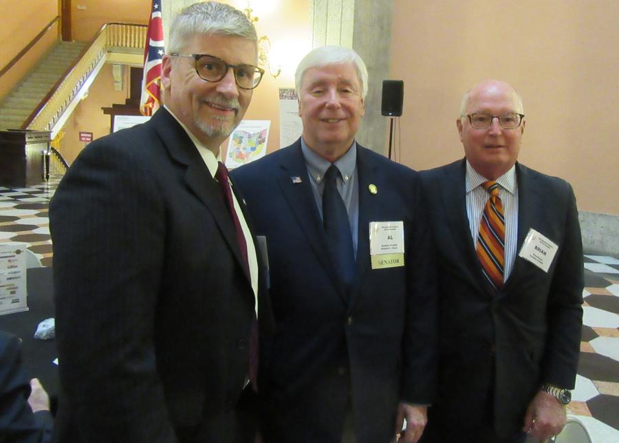 (L-R): Patrick Jacomet, OAIMA executive director, speaks with Ohio State Senator Al Landis and Brian Barger of Eastman & Smith.
(CEG photo)