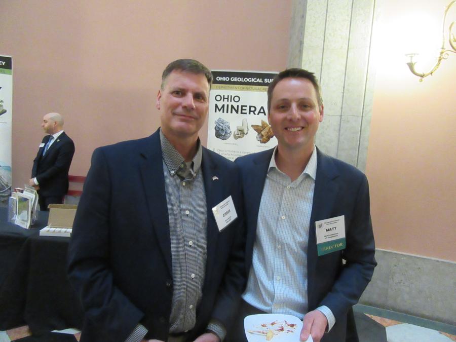 Chris Harris (L), Ohio CAT Con/Agg manager, catches up with C.F. Poeppelman’s Matt Poeppelman at the reception. 
(CEG photo)