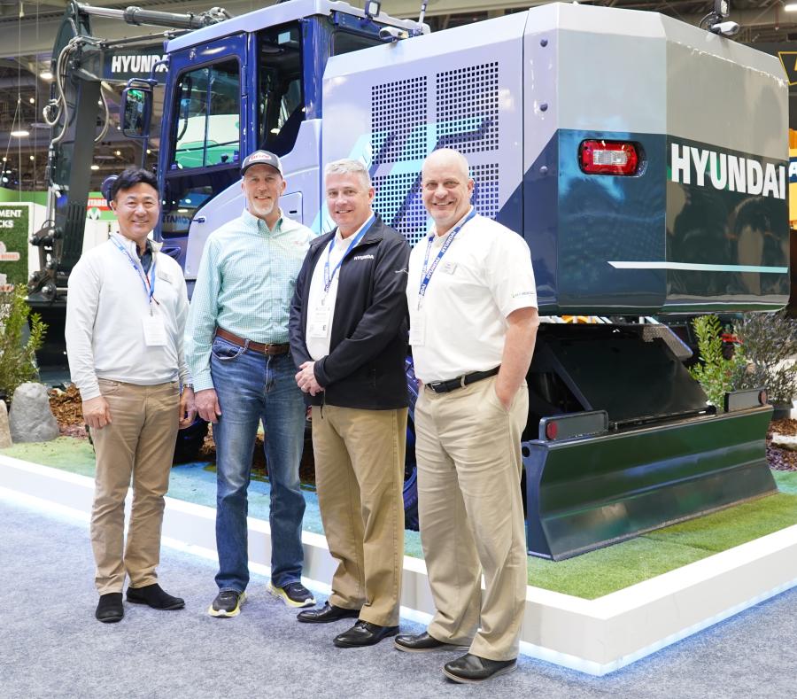During the recent ConExpo-Con/AGG show, members of Hyundai Construction Equipment Americas senior management team congratulate Taylor Construction Equipment on the dealership’s expansion into Ohio and Indiana. (L-R) are Stan Park, president, Hyundai Construction Equipment Americas; Tim Gerbus, sales manager, Taylor Construction Equipment; Mike Ross, senior vice president of sales, HCEA; and Matt Gansser, director of distribution and marketing, HCEA.