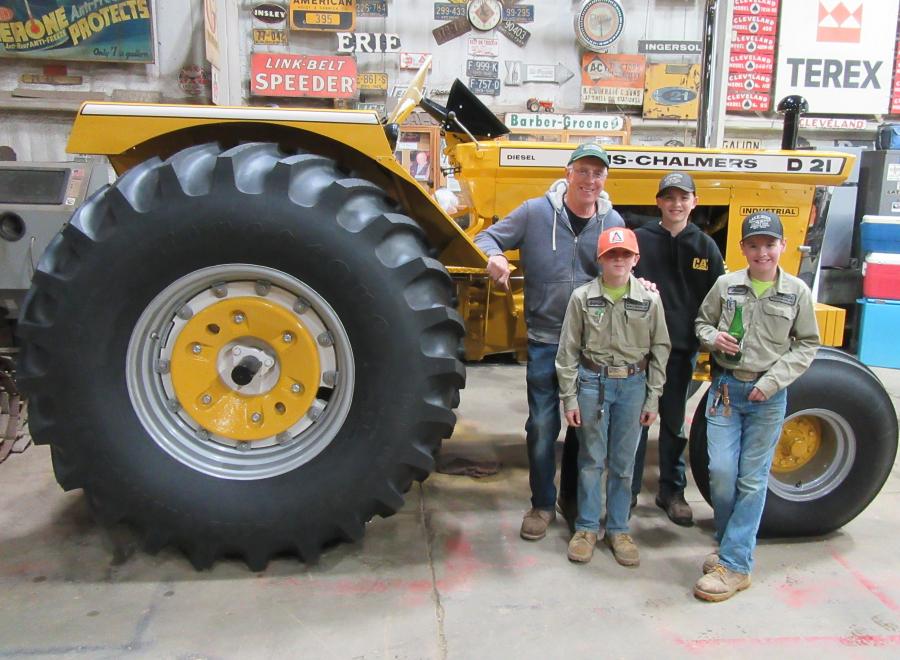 (L-R): Ron Kotkowski is joined by the future fourth-generation Lakeside Sand & Gravel management team, Gabriel Jones, Harry Kotkowski and Adam Sly to showcase the latest restoration project, a 1964 Allis-Chalmers D21 industrial tractor.
(CEG photo) 