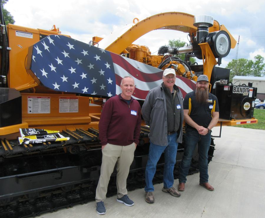 (L-R): Bandit Industries’ Craig Davis, William Porter and Kyle Graber were ready to discuss the company’s line of wood and waste processing equipment at the event. 
(CEG photo)