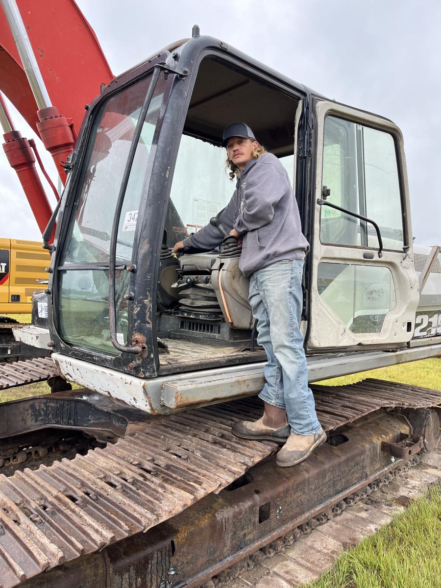Travis Carico of Abdella Services looks over this Link-Belt 210 excavator.
(CEG photo)