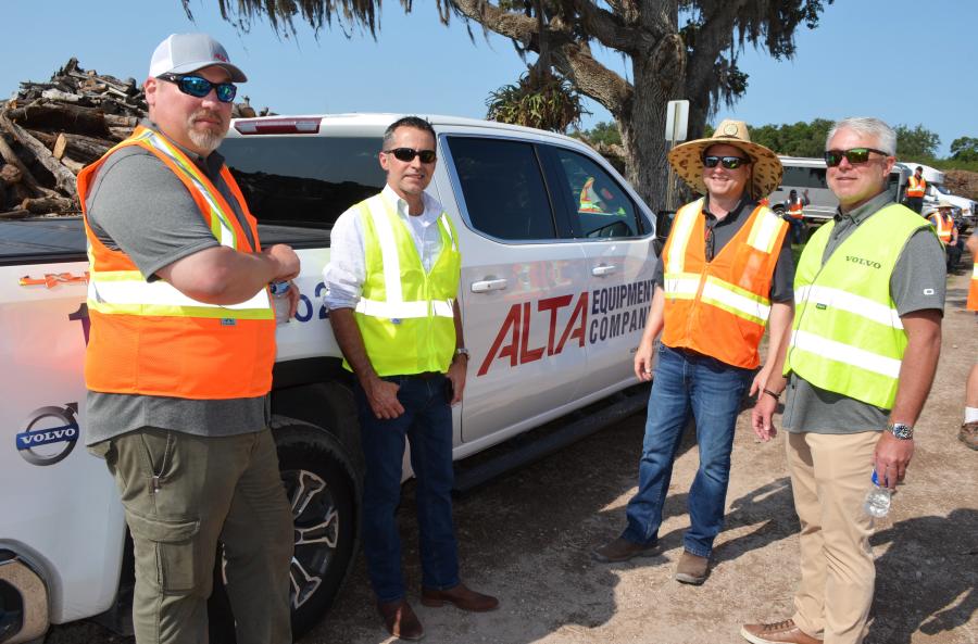 (L-R): Nick Furey, Alta Equipment Company; John Brooks, Recovered Resources Group, Fernadina Beach, Fla.; and Justin Sklute and Jeremy Daniel of Alta Equipment discuss some of the machines that were being demoed. 
(CEG photo)