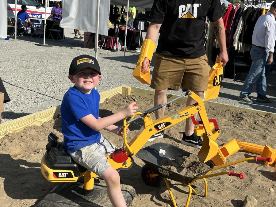 Brayden Knapp enjoys some sandbox time with Caterpillar machines made just his size in the hopes that someday he will be an H.O. Penn technician just like his Uncle Will.
(CEG photo)