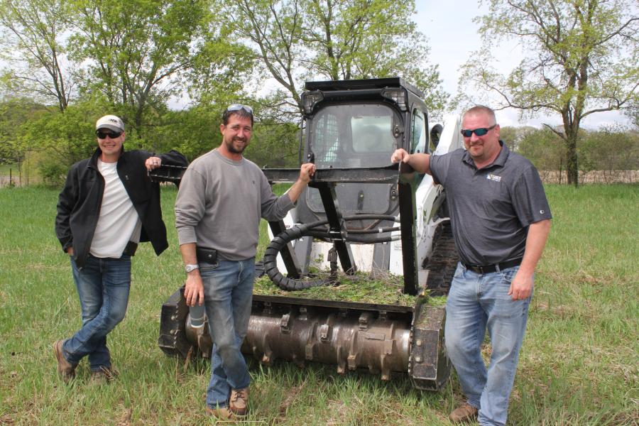 (L-R): Derrick Lamotte, operator of Adam Bishop Tilling, Blooming Prairie, Minn.; Adam Bishop, owner of Adam Bishop Tilling; and Tim Audette, Sanco outside sales, Rochester, Minn., with a Diamond 60-in. drum mulcher on a Bobcat T770. Bishop said they purchased a Diamond disc mulcher and brush cutter. He brought his team out for some training from the experts.
(CEG photo)