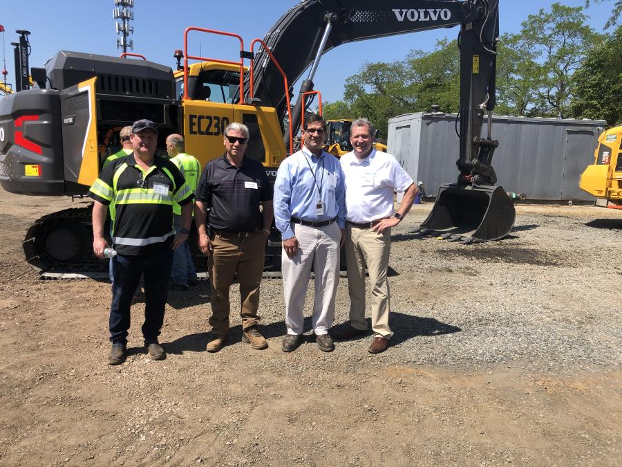 (L-R): Lars Arnold, product manager of Volvo CE; Bill Almasi of Almasi Companies; Chris Johnson, senior vice president of Tutor Perini; and Tim Watters, president of Hoffman Equipment, pose for a photo during the Volvo electric equipment demonstration event in Piscataway, N.J.
(CEG photo)