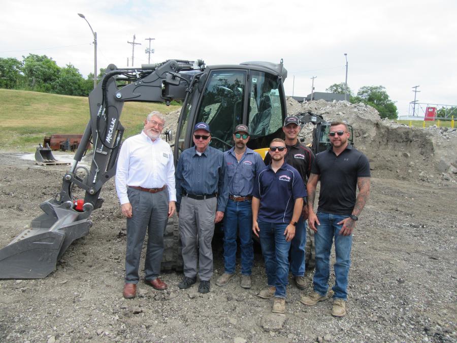 (L-R): Mecalac North America General Manager Peter Bigwood joined Hapchuk Inc.’ Dave Hapchuk, Jason Liddle, Jason Dever, Gary Conkle and Josh Locy to review the Mecalac machines at Anderson Equipment’s demonstration event.
(CEG photo)