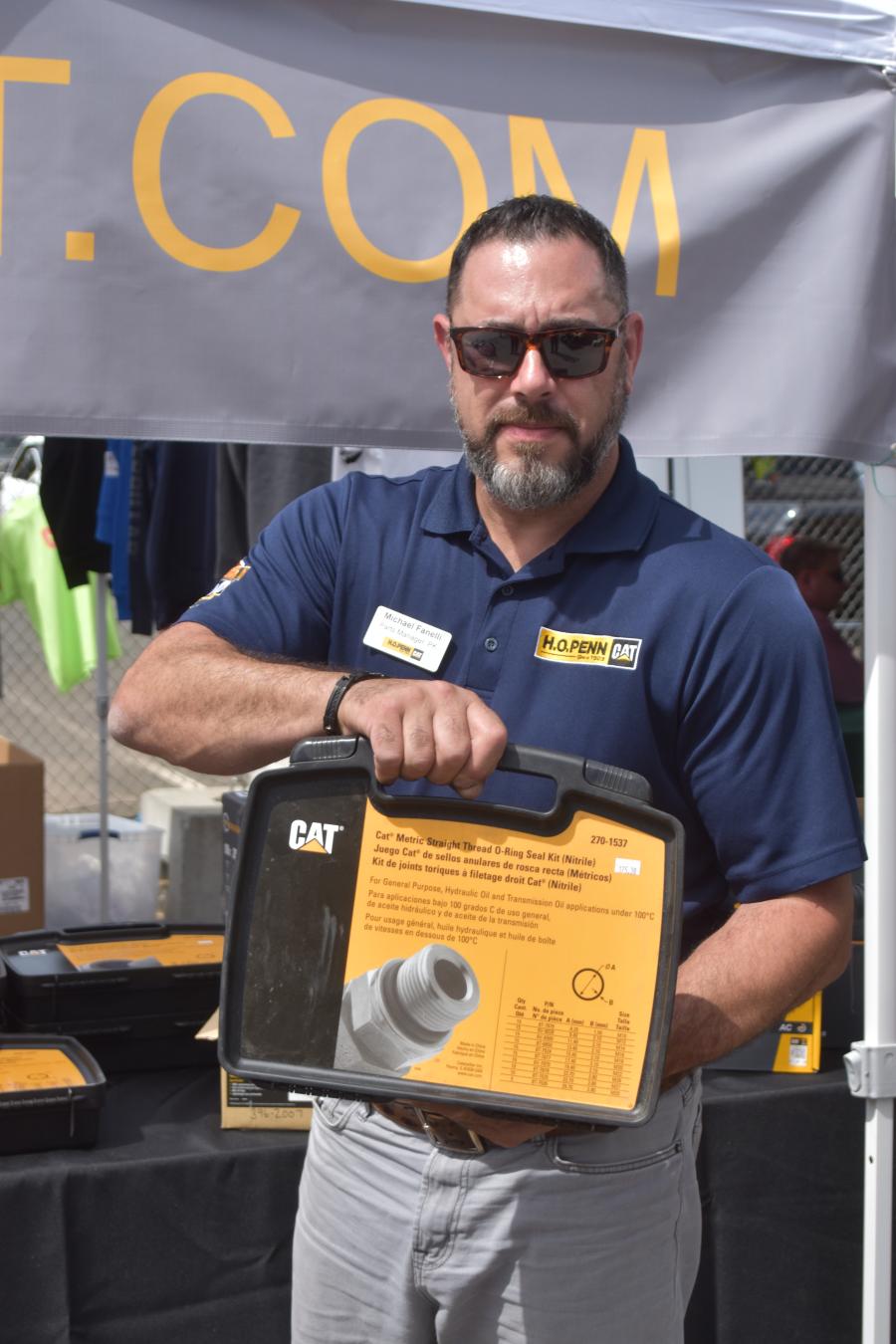 From the Cat merchandise exhibit, Michael Fanelli offers a Caterpillar O-ring kit.
(CEG photo) 