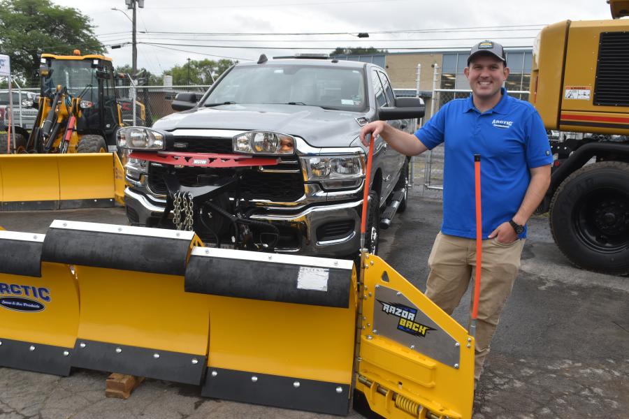 Arctic Snow and Ice Products introduces its new truck-mounted sectional pusher. Representing Arctic is John Pinckney.
(CEG photo)