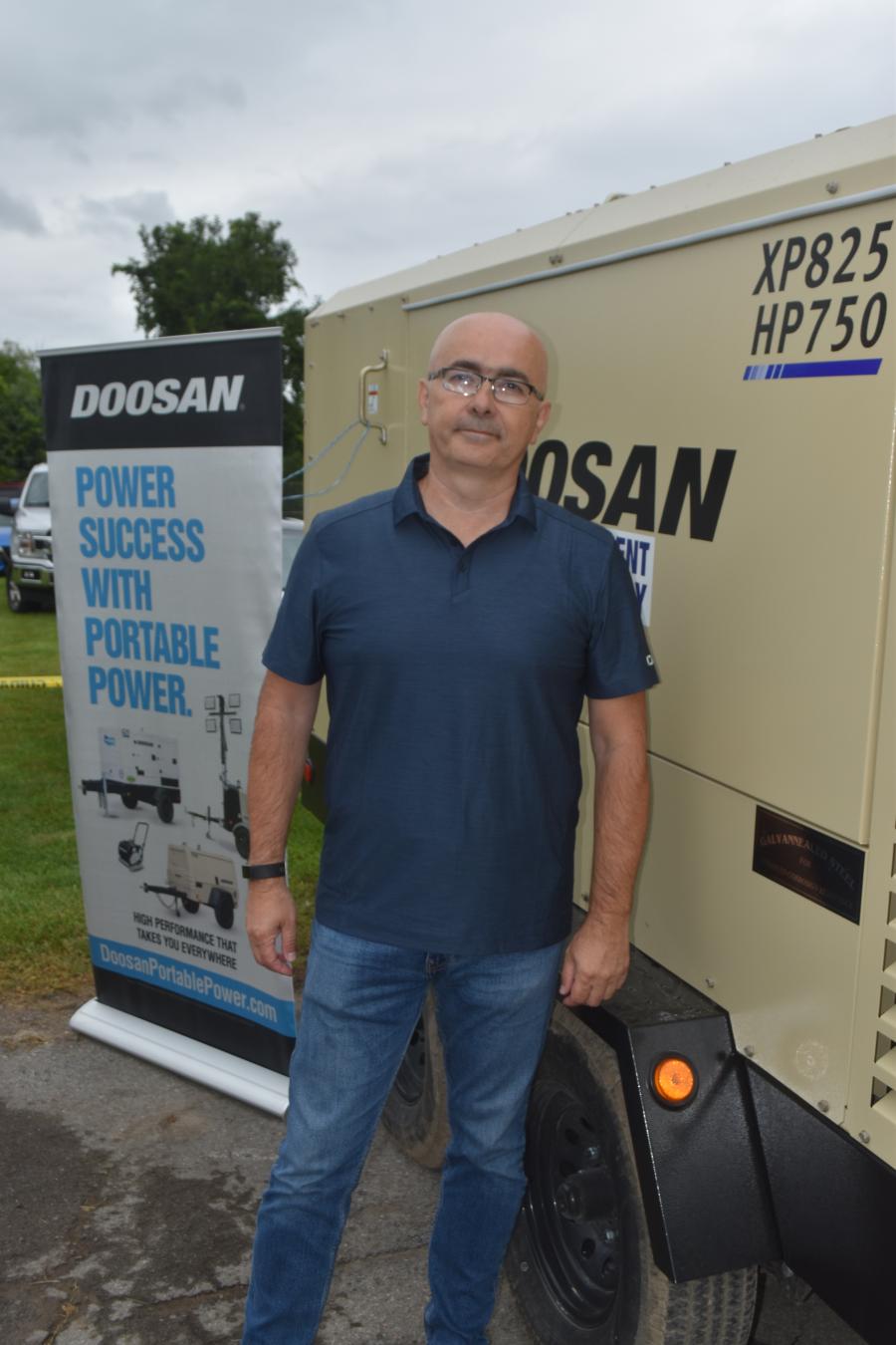Darko Ilic, district sales manager of Doosan Portable Power, discusses the various sizes and options of portable power plants and light towers from Doosan.
(CEG photo)