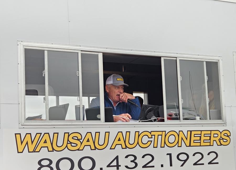 Carl Theorin, co-founder of Wausau Auctioneers, goes over terms and conditions of the auction. 
(CEG photo)