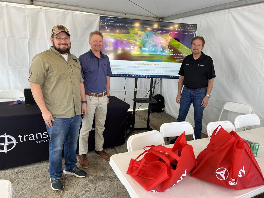 (L-R): Josh Byers and Mike Fitzsimmons, both pf Wayne Brothers Companies, Davidson, N.C., speak with Donnie Quinn of AGTEC about Leica products.
(CEG photo)