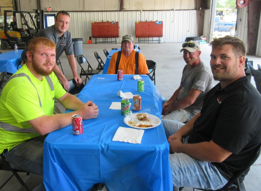 Southeastern Equipment Company Sales Representative Chris Holter (standing) catches up with (L-R) Raynes & Company’s David Wittington, Clyde Raynes and John Meadows, along with Operations Manager Jeremy Eagan.
(CEG photo)