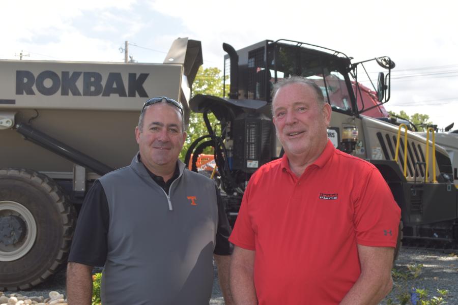 Marty Galasso (L) of Lancaster Development checks out the latest offerings from Rokbak trucks with Scott Dubois of Contractors Sales Company.
(CEG photo)