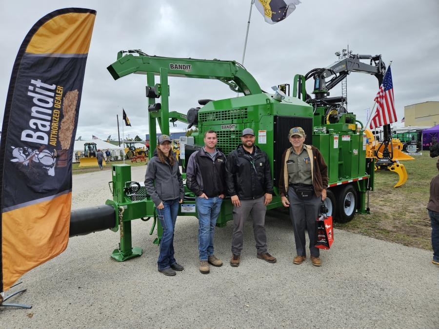(L-R): Brooks Tractor’s Paula Ritter, Derek Vanderheiden and Taylor Lutzke talked with John Dittbrender of Dittbrender Logging about this Bandit 21XP woodchipper.
(CEG photo)