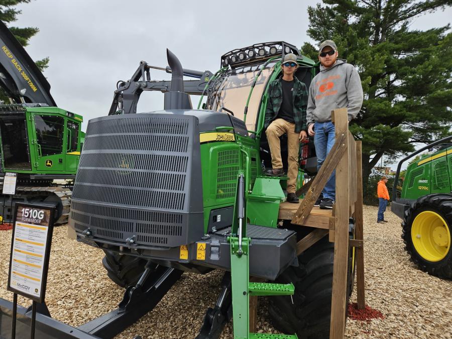 Jack Soderman (L) and Michael Getzloff looked inside the cab of this John Deere 1510G forwarder.
(CEG photo)