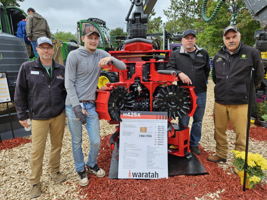 (L-R): Clint Amma of McCoy Construction & Forestry; Morgan Miskovich of MM Timber Harvesting; Mike Miskovich of MM Timber Harvesting; and Sam Lulich of McCoy Construction & Forestry, talk about this Waratah H425X processing head.
(CEG photo)